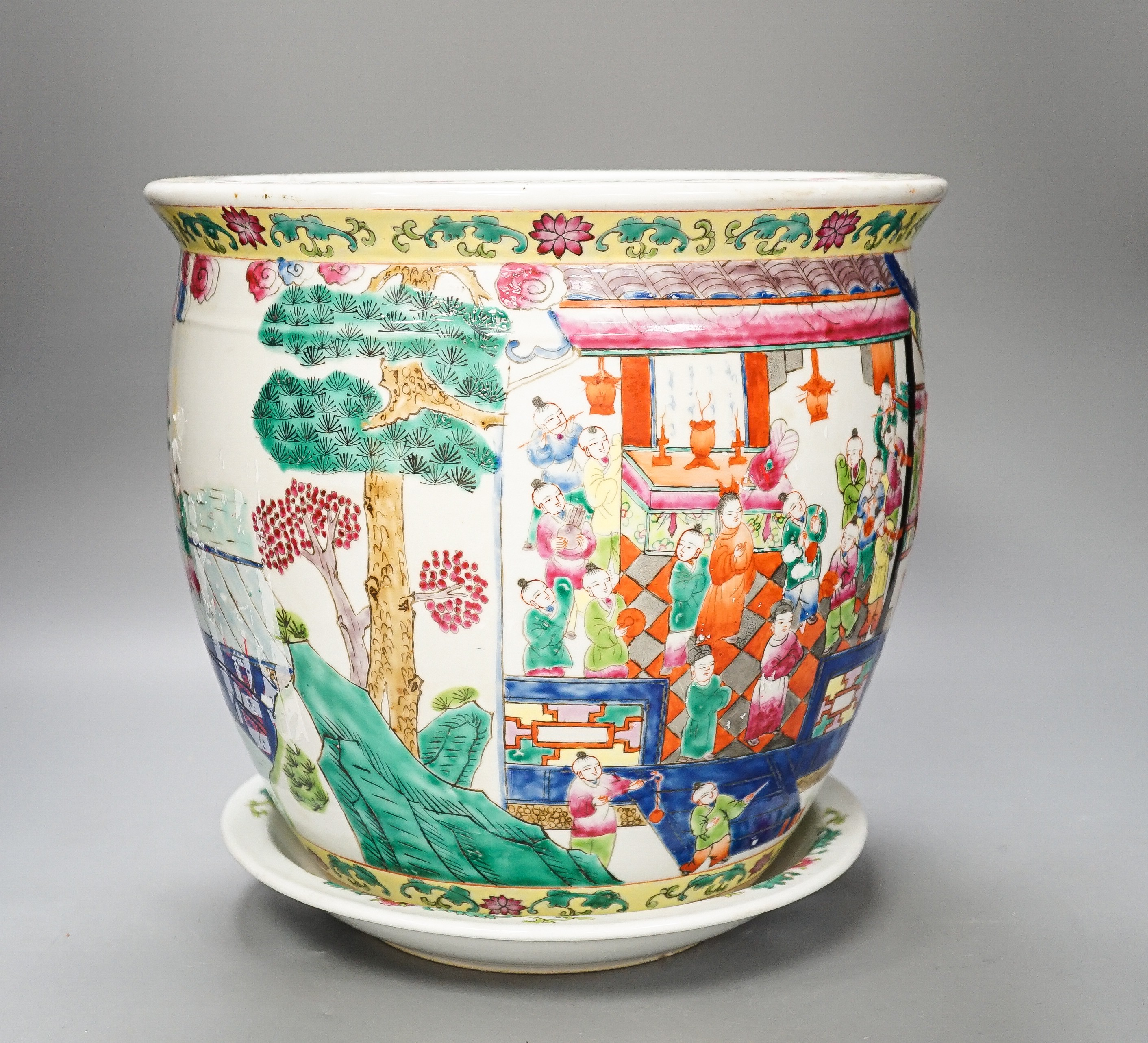 A 20th century Chinese famille rose jardiniere and stand total height 30cm